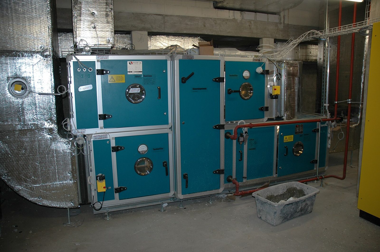 Air handling units in a building plant room.